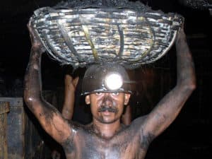 man carrying basket full of gold