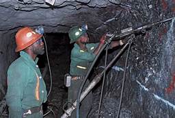 miners digging with modern tools