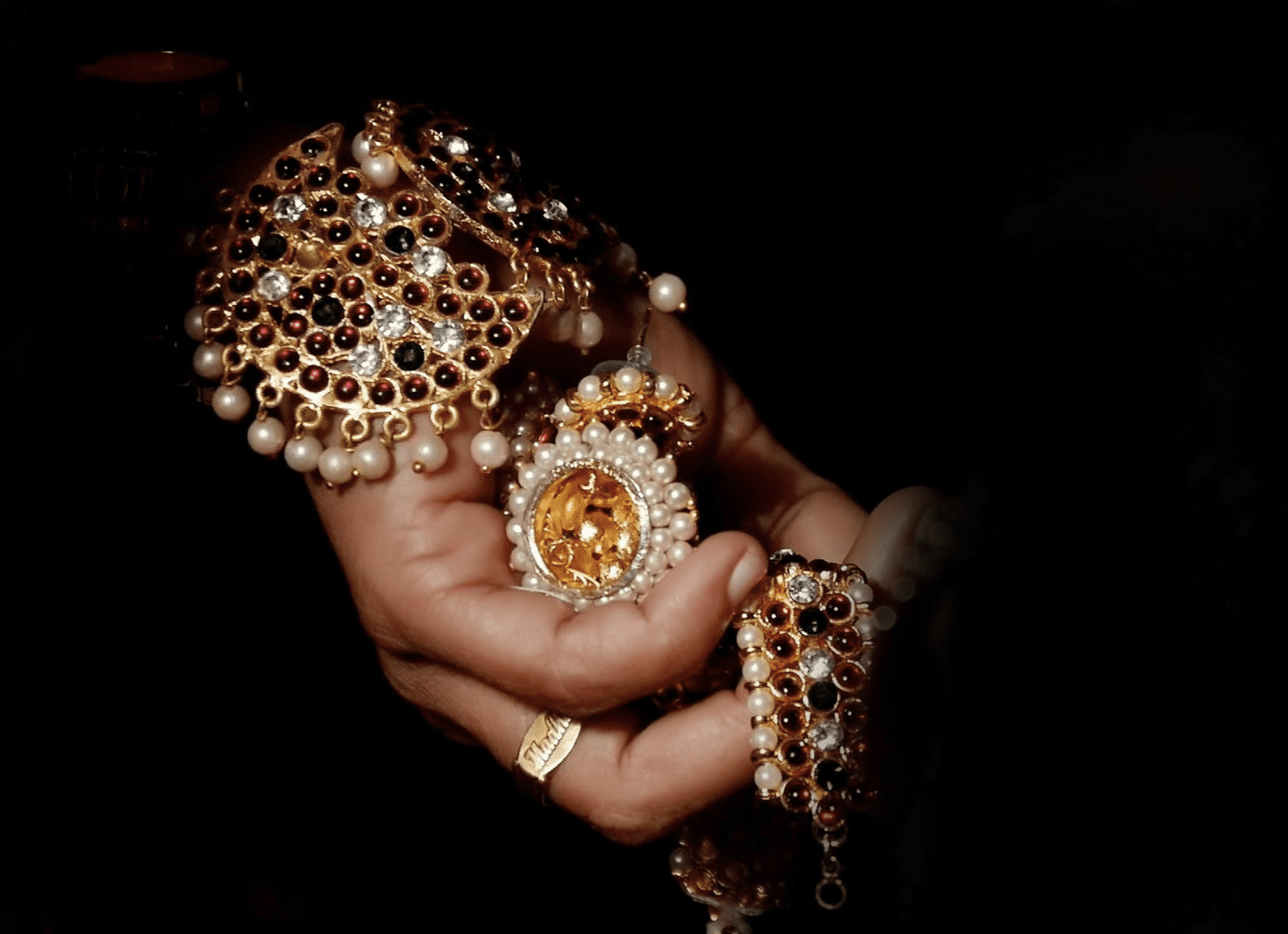 hand holding jewelries