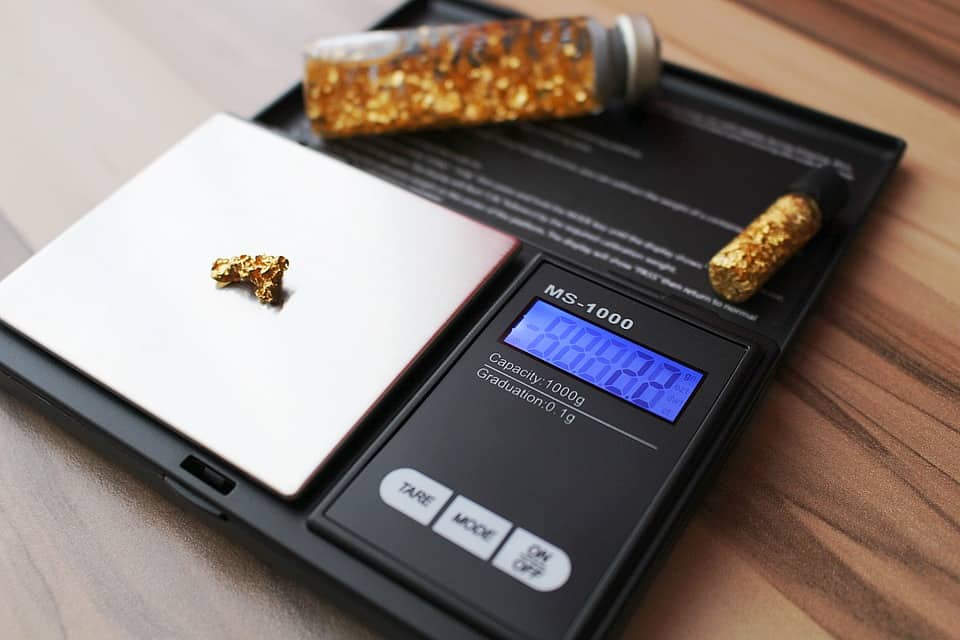 weighing scale and gold